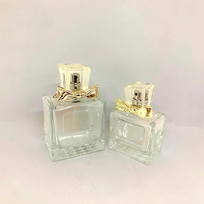 50ml 100ml Chai nước hoa tinh tế Chai thủy tinh Hợp kim Nơ Xịt Chai rỗng Phù hợp với Nhà máy Tùy chỉnh